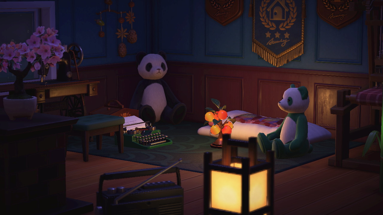 Dark room lit only by lamps, stuffed pandas sit on the floor.